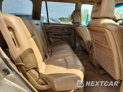 Zdjęcie 11 z 13 samochodu: 2004 HONDA PILOT EXL VIN:2HKYF18664H508482 - miniatura