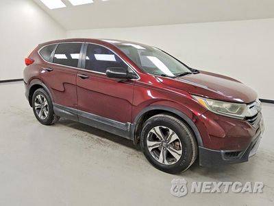 Czwarte zdjęcie samochodu z boku: 2018 HONDA CR-V LX VIN:2HKRW5H31JH421358 - miniatura