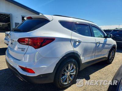 Trzecie zdjęcie samochodu z tyłu: 2017 HYUNDAI SANTA FE SPORT 2.0T VIN:5XYZUDLA4HG389626 - miniatura
