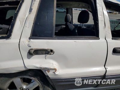 Zdjęcie 10 z 12 samochodu: 2004 JEEP GRAND CHEROKEE LAREDO VIN:1J4GX48S94C422905 - miniatura