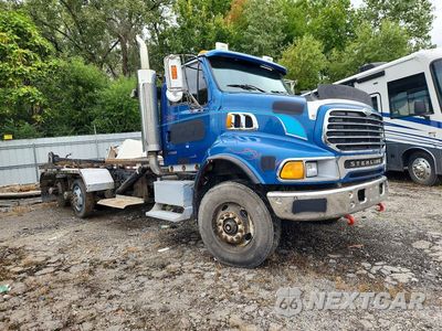 Czwarte zdjęcie samochodu z boku: 2006 STERLING L9500 ROLL-OFF CONTAINER TRUCK VIN:2FZMAZCV56AV17692 - miniatura