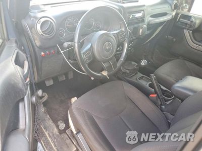 Zdjęcie 8 z 12 samochodu: 2016 JEEP WRANGLER SPORT VIN:1C4AJWAG4GL294754 - miniatura