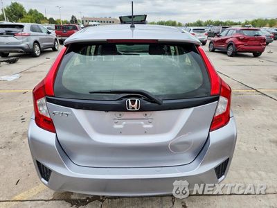 Zdjęcie 6 z 13 samochodu: 2017 HONDA FIT LX VIN:JHMGK5H57HS020346 - miniatura