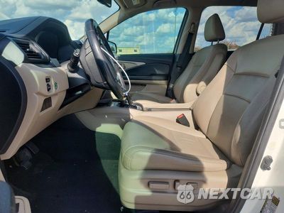 Zdjęcie 7 z 14 samochodu: 2017 HONDA PILOT EXL VIN:5FNYF5H50HB047881 - miniatura