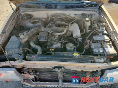 Zdjęcie 11 z 13 samochodu: 2000 TOYOTA TACOMA BASE VIN:5TEVL52N8YZ716756 - miniatura