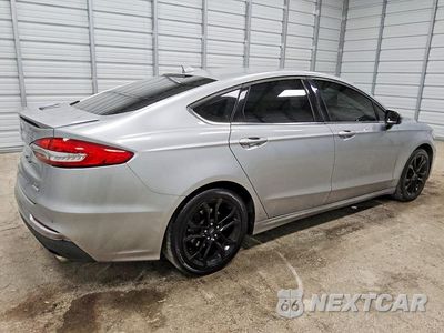 Trzecie zdjęcie samochodu z tyłu: 2020 FORD FUSION SE VIN:3FA6P0HD3LR101945 - miniatura