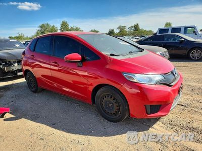 Czwarte zdjęcie samochodu z boku: 2015 HONDA FIT LX VIN:3HGGK5H55FM732220 - miniatura