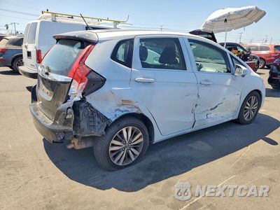 Trzecie zdjęcie samochodu z tyłu: 2016 HONDA FIT EX VIN:JHMGK5H76GX029526 - miniatura