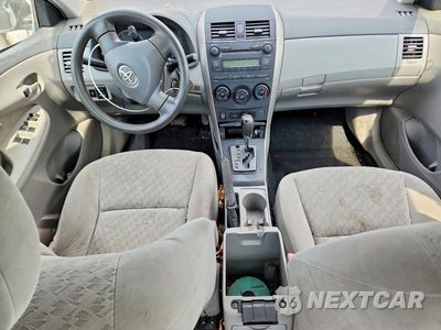 Zdjęcie 8 z 13 samochodu: 2009 TOYOTA COROLLA LE VIN:JTDBL40E599076101 - miniatura