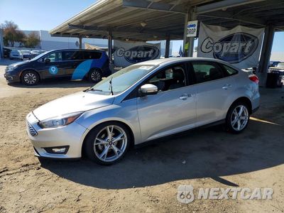 2016 FORD FOCUS TITANIUM 1FADP3J22GL203520 - główne zdjęcie licytacji z USA - miniatura