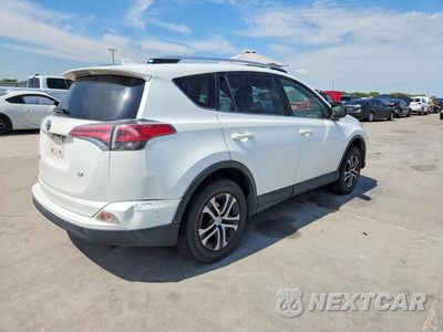 Trzecie zdjęcie samochodu z tyłu: 2016 TOYOTA RAV4 LE VIN:JTMZFREV5GJ062321 - miniatura