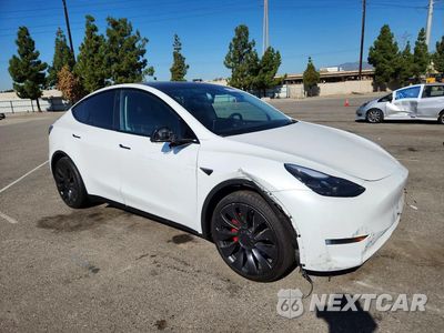 Czwarte zdjęcie samochodu z boku: 2023 TESLA MODEL Y VIN:7SAYGDEF8PF645609 - miniatura