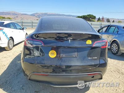 Zdjęcie 6 z 14 samochodu: 2023 TESLA MODEL Y VIN:7SAYGDEE6PF922944 - miniatura