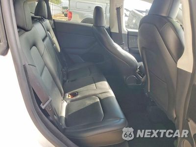 Zdjęcie 10 z 12 samochodu: 2023 TESLA MODEL Y VIN:7SAYGDEE6PA109343 - miniatura