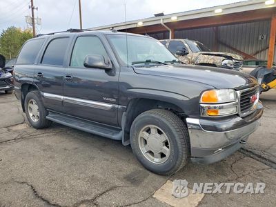 Czwarte zdjęcie samochodu z boku: 2005 GMC YUKON VIN:1GKEK13T15J153147 - miniatura