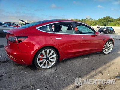 Trzecie zdjęcie samochodu z tyłu: 2019 TESLA MODEL 3 VIN:5YJ3E1EB2KF419860 - miniatura