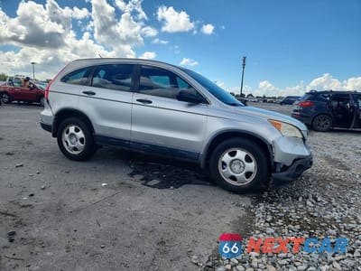 Czwarte zdjęcie samochodu z boku: 2009 HONDA CR-V LX VIN:3CZRE383X9G704699 - miniatura