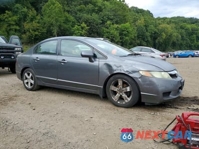 Czwarte zdjęcie samochodu z boku: 2010 HONDA CIVIC LX-S VIN:2HGFA1F6XAH507074 - miniatura