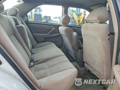 Zdjęcie 10 z 12 samochodu: 2001 TOYOTA CAMRY LE VIN:4T1BG22K11U789506 - miniatura