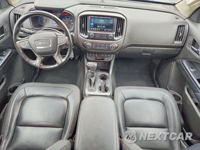 Zdjęcie 8 z 12 samochodu: 2021 GMC CANYON AT4 VIN:1GTG6FEN5M1124379 - miniatura