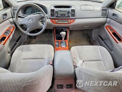 Zdjęcie 8 z 12 samochodu: 2003 TOYOTA CAMRY XLE VIN:4T1BE30K83U170046 - miniatura