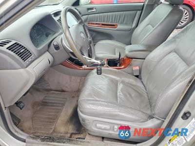 Zdjęcie 7 z 12 samochodu: 2004 TOYOTA CAMRY XLE VIN:4T1BE30KX4U275365 - miniatura