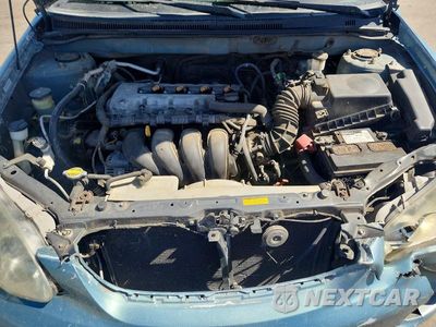 Zdjęcie 11 z 12 samochodu: 2005 TOYOTA COROLLA CE VIN:1NXBR32E65Z454127 - miniatura