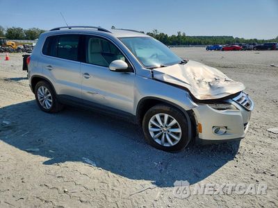 Czwarte zdjęcie samochodu z boku: 2011 VOLKSWAGEN TIGUAN S VIN:WVGAV7AX8BW522364 - miniatura