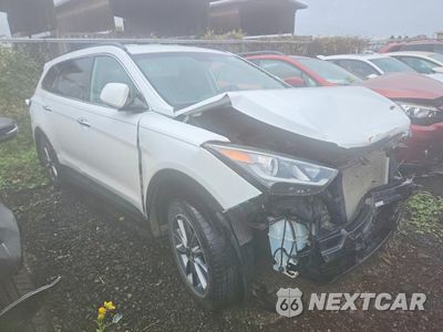 Czwarte zdjęcie samochodu z boku: 2017 HYUNDAI SANTA FE SE VIN:KM8SM4HF4HU244375 - miniatura