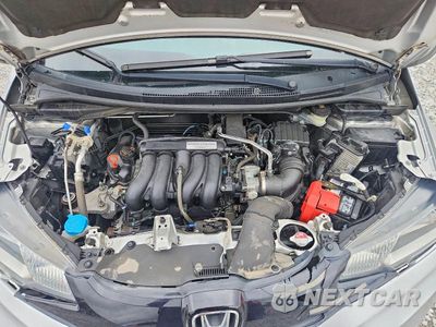 Zdjęcie 11 z 12 samochodu: 2015 HONDA FIT LX VIN:3HGGK5H56FM709237 - miniatura