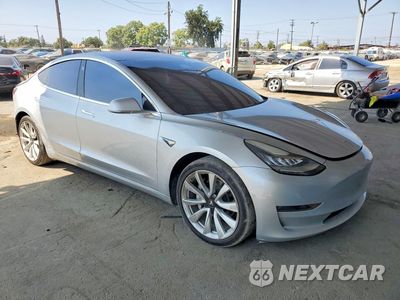 Czwarte zdjęcie samochodu z boku: 2018 TESLA MODEL 3 VIN:5YJ3E1EA9JF052655 - miniatura