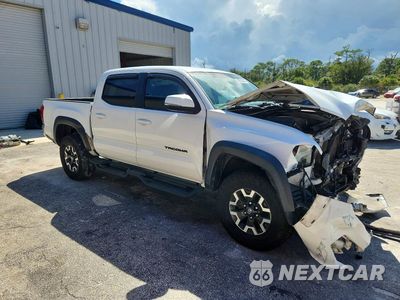 Czwarte zdjęcie samochodu z boku: 2017 TOYOTA TACOMA TRD OFF-ROAD VIN:3TMAZ5CN7HM031771 - miniatura