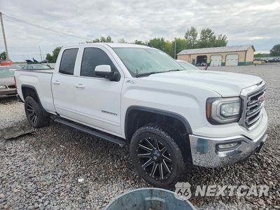 Czwarte zdjęcie samochodu z boku: 2016 GMC SIERRA K1500 SLE VIN:1GTV2MEC1GZ110135 - miniatura