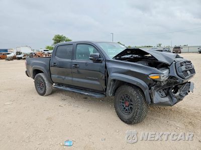 Czwarte zdjęcie samochodu z boku: 2022 TOYOTA TACOMA TRD PRO VIN:3TYCZ5AN7NT067973 - miniatura