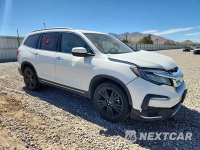 Czwarte zdjęcie samochodu z boku: 2020 HONDA PILOT TOURING VIN:5FNYF6H66LB056351 - miniatura