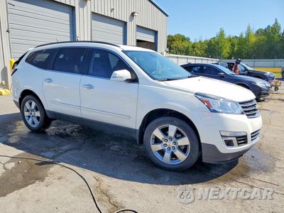 Czwarte zdjęcie samochodu z boku: 2015 CHEVROLET TRAVERSE LTZ VIN:1GNKRJKD3FJ259192 - miniatura