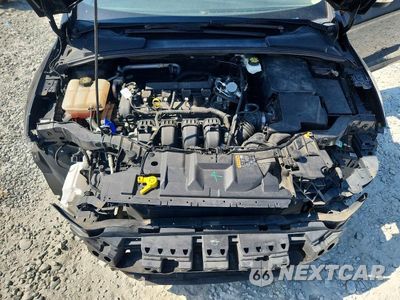 Zdjęcie 11 z 13 samochodu: 2017 FORD FOCUS TITANIUM VIN:1FADP3N27HL330856 - miniatura