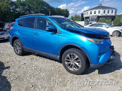 Czwarte zdjęcie samochodu z boku: 2017 TOYOTA RAV4 HYBRID XLE VIN:JTMRJREV1HD111075 - miniatura