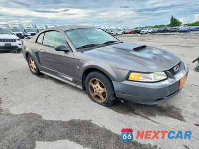 Czwarte zdjęcie samochodu z boku: 2003 FORD MUSTANG VIN:1FAFP40403F373837 - miniatura