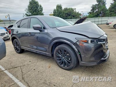 Czwarte zdjęcie samochodu z boku: 2022 MAZDA CX-5 SIGNATURE VIN:JM3KFBXYXN0648670 - miniatura