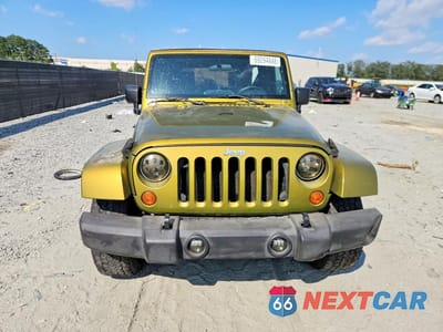 Piąte zdjęcie samochodu w środku: 2007 JEEP WRANGLER SAHARA VIN:1J4GB59137L142248 - miniatura