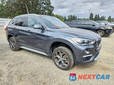 Czwarte zdjęcie samochodu z boku: 2017 BMW X1 XDRIVE28I VIN:WBXHT3C34H5F83209 - miniatura