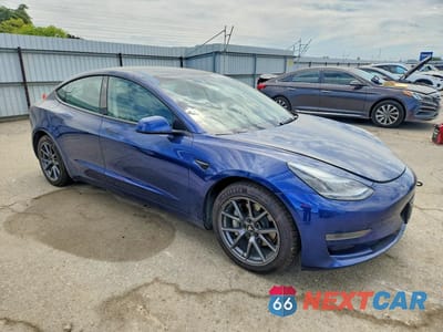 Czwarte zdjęcie samochodu z boku: 2022 TESLA MODEL 3 VIN:5YJ3E1EA5NF288869 - miniatura