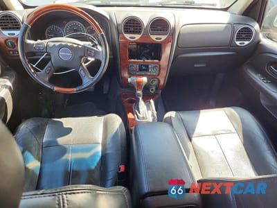 Zdjęcie 8 z 12 samochodu: 2006 GMC ENVOY DENALI VIN:1GKET63M262199844 - miniatura