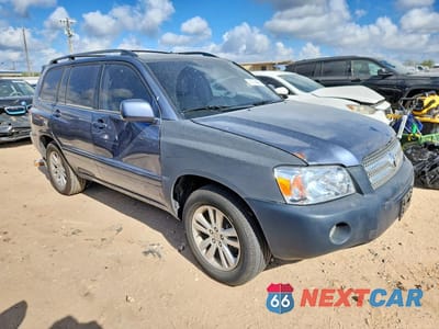Czwarte zdjęcie samochodu z boku: 2007 TOYOTA HIGHLANDER HYBRID VIN:JTEDW21A570021029 - miniatura