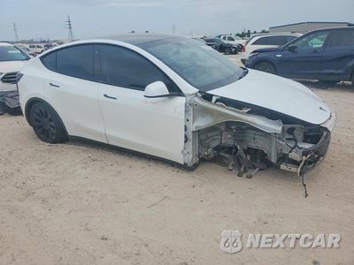Czwarte zdjęcie samochodu z boku: 2023 TESLA MODEL Y VIN:7SAYGDEE4PA117540 - miniatura