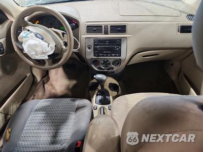 Zdjęcie 8 z 13 samochodu: 2005 FORD FOCUS ZXW VIN:1FAFP36NX5W221738 - miniatura