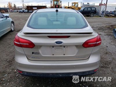 Zdjęcie 6 z 12 samochodu: 2017 FORD FOCUS TITANIUM VIN:1FADP3J29HL264767 - miniatura