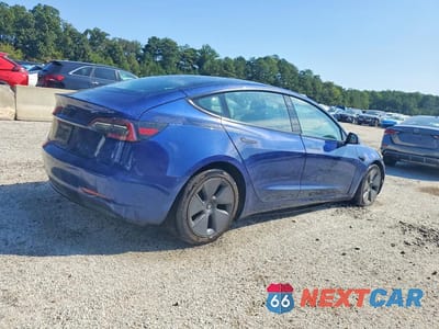 Trzecie zdjęcie samochodu z tyłu: 2023 TESLA MODEL 3 VIN:5YJ3E1EA4PF433788 - miniatura