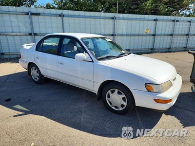 Czwarte zdjęcie samochodu z boku: 1997 TOYOTA COROLLA DX VIN:1NXBB02E9VZ652932 - miniatura